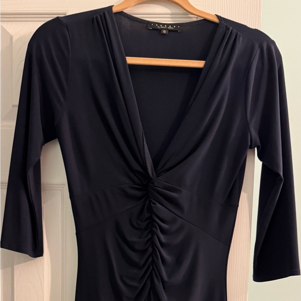 Extremely flattering long sleeve dark blue dress